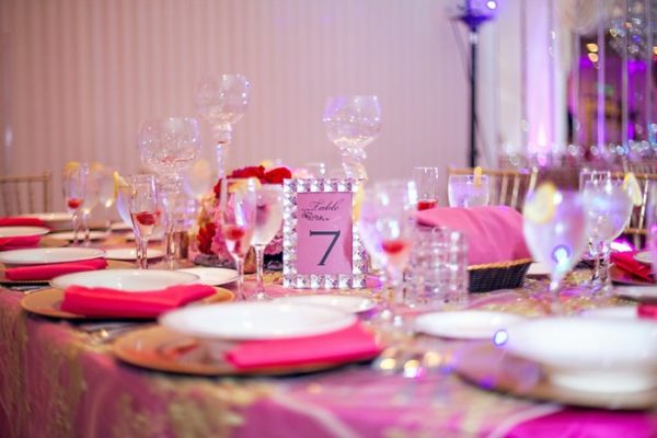 Gold and fuchsia wedding decor table